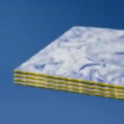 Photo of vinyl stack showcasing the spine of the album artwork for ZEMENT PASSAGEN 
